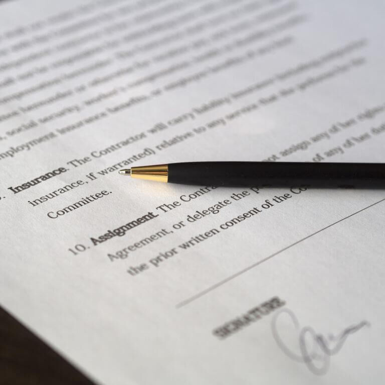 pen lying on top of paper document